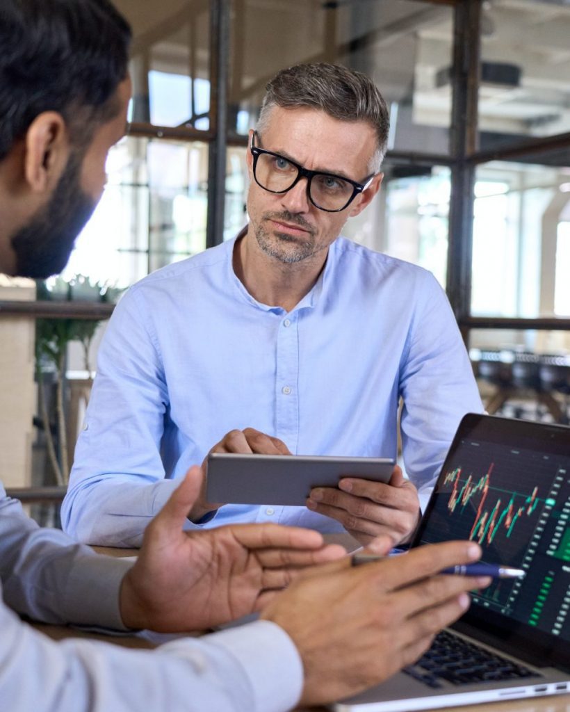 two-traders-brokers-stock-exchange-market-investors-discussing-crypto-trading--e1660055106411-pt0iqofljll0w74l1gz8lq4mbz0620sdkifo4x9jpc